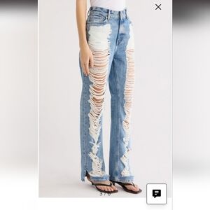 Distressed Blue Jeans with White Rips